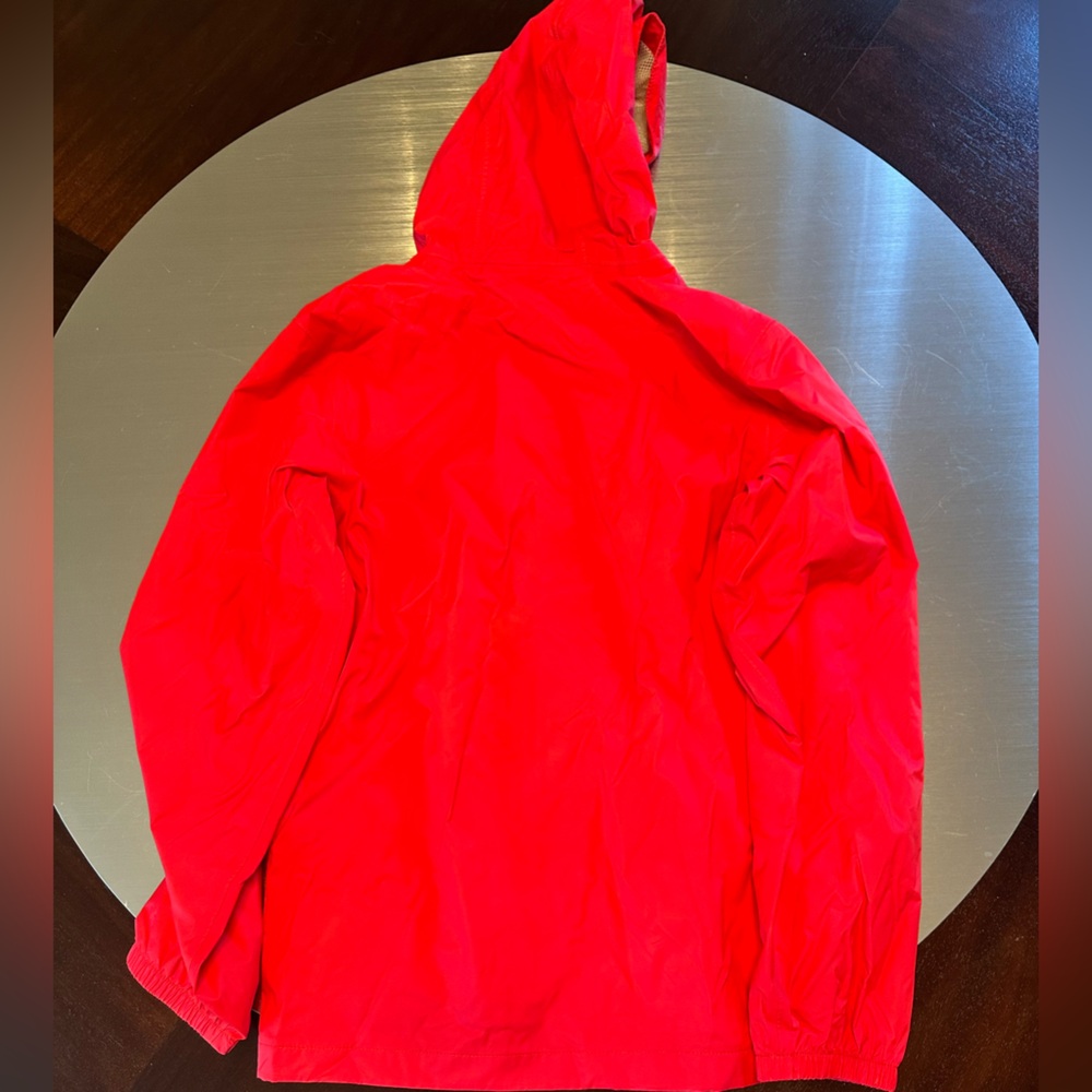 Boys north face rain jacket. Red. Size 14/16. Excellent condition.